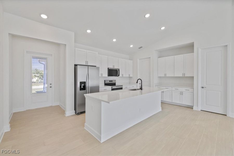Furnished interior view inside a new home in Cape Coral, Cape Coral (Image 11). Furnished interior view inside a new home in Cape Coral, Cape Coral (Image 11).
