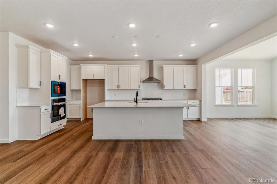 Furnished interior view inside a new home in Harvest Crossing, Aurora (Image 6).