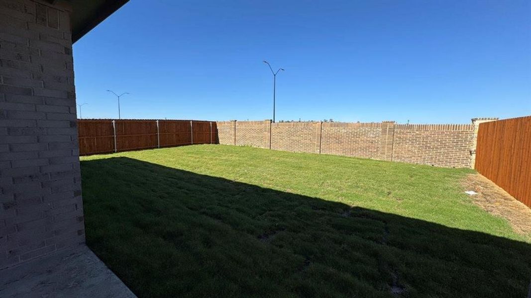 Exterior details and patio area of a home in Morningstar, Fort Worth (Image 2).