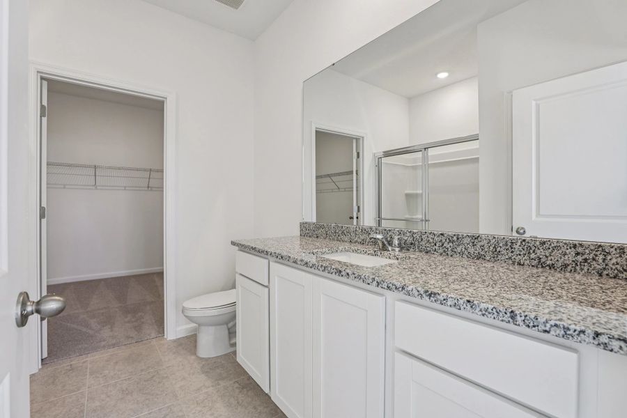 Representative furnished interior of a home built from the Halo by Starlight Homes in Hawks Run, Kissimmee (Image 11).