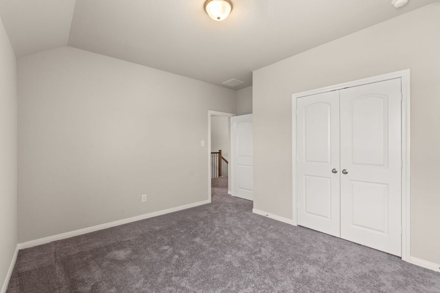 An additional view of the fourth bedroom with closet.