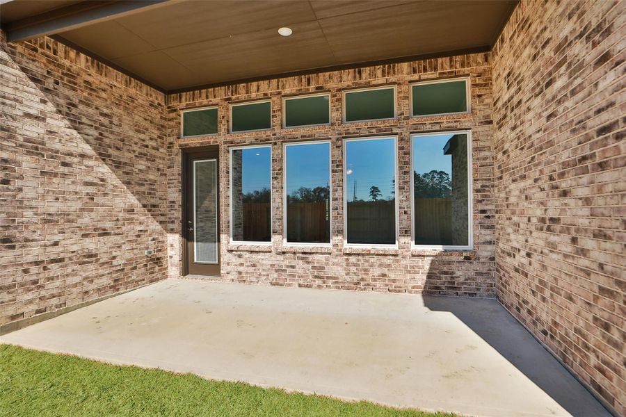 Exterior details and patio area of a home in Sundance Cove, Crosby (Image 3). Exterior details and patio area of a home in Sundance Cove, Crosby (Image 3).