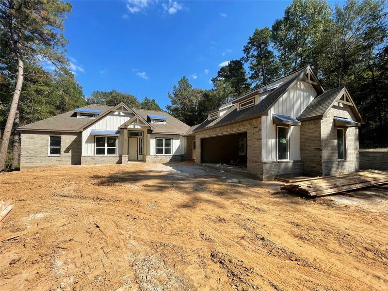 View of the Home and Detached Garage from the Driveway area View of the Home and Detached Garage from the Driveway area