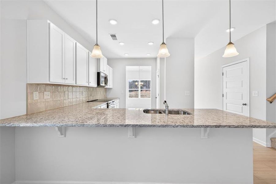 Furnished interior view inside a new home in Allen Manor, Hoschton (Image 9).