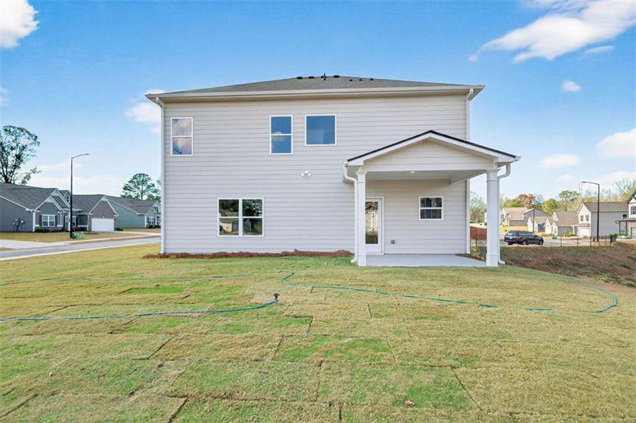 Exterior details and patio area of a home in Garrett Preserve, Douglasville (Image 2).