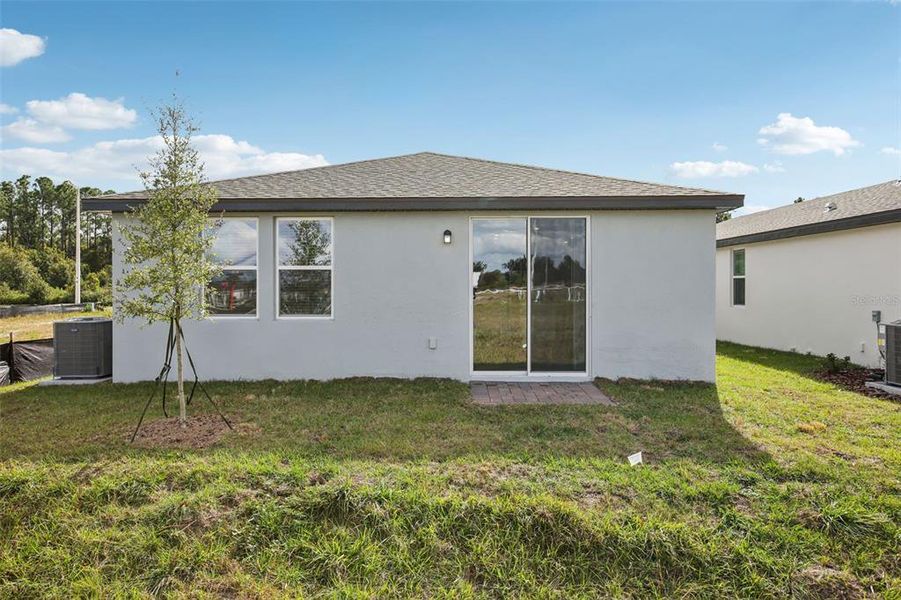 Exterior details and patio area of a home in Villamar - Classic Series, Winter Haven (Image 3).