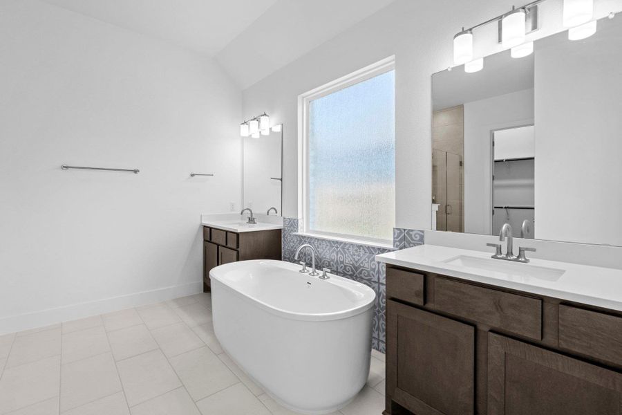 Primary Bath retreat with dual vanities & soaking tub