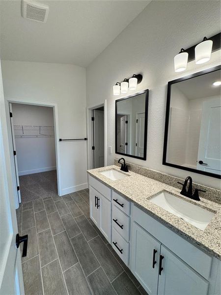 Furnished interior view inside a new home in Watercress Cove, North Port (Image 8).