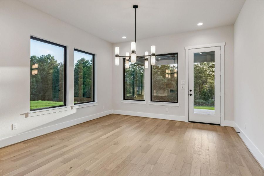 Dining Area, off the Kitchen, with direct access to the Back Porch and yard. Dining Area, off the Kitchen, with direct access to the Back Porch and yard.