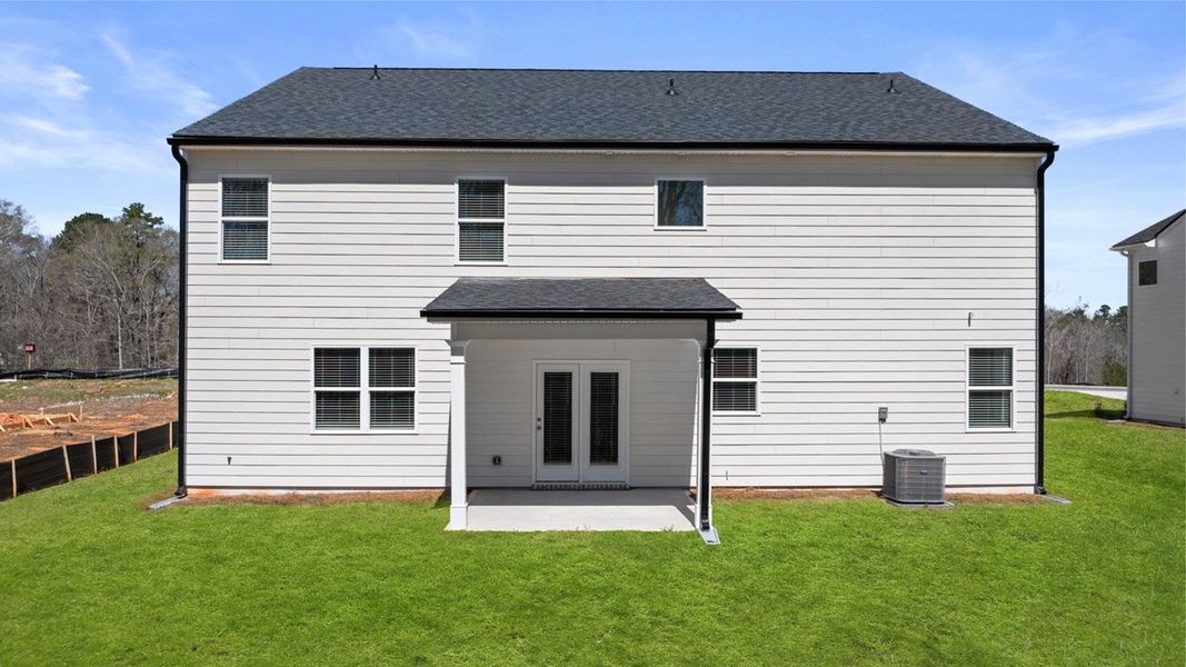 Exterior details and patio area of a home in Brooks Station, Dacula (Image 3).