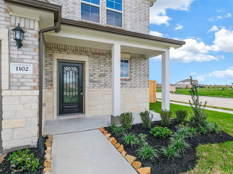 Exterior details and patio area of a home in Emberly, Beasley (Image 3).