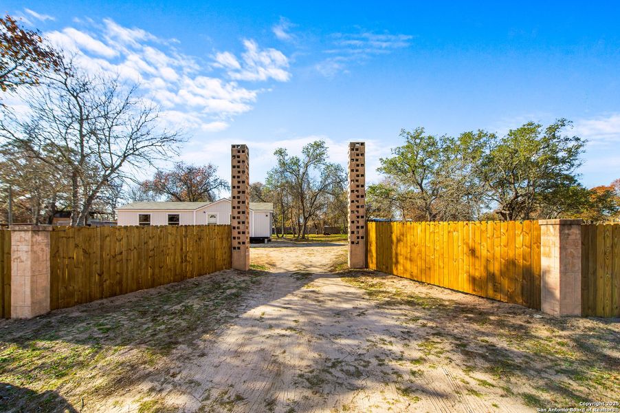 Exterior details and patio area of a home in , Elmendorf (Image 22).