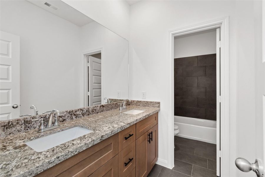 Furnished interior view inside a new home in Harmony Cove, Humble (Image 9).