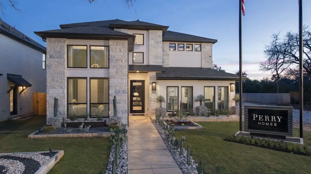 Front exterior of a new home in Artavia, Conroe, TX, highlighting curb appeal (Image 2).