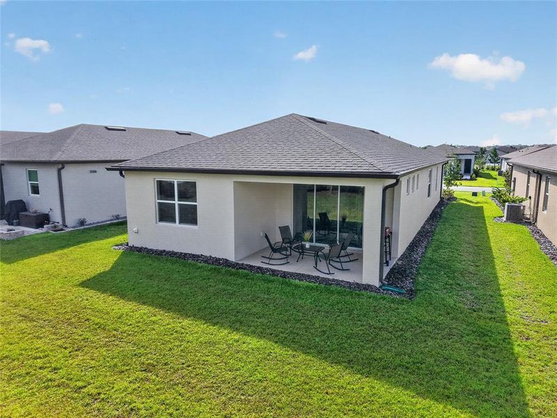 Exterior details and patio area of a home in Del Webb Stone Creek, Ocala (Image 25).