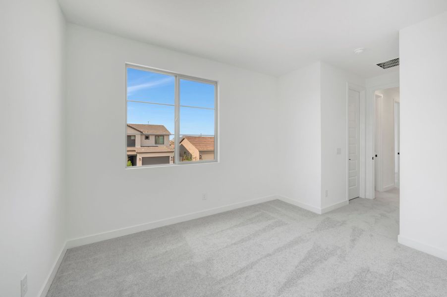 Spacious, unfurnished interior of a new home in Soleo, San Tan Valley (Image 32).