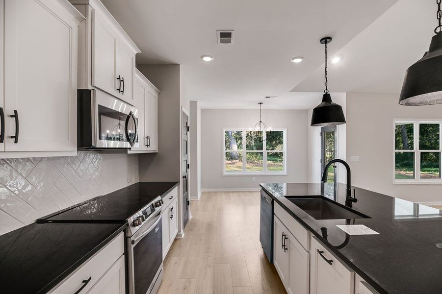 Furnished interior view inside a new home in LOVVORN ESTATES, Carrollton (Image 9).