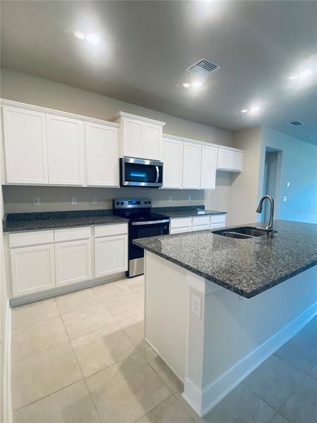 Furnished interior view inside a new home in , St. Cloud (Image 4).