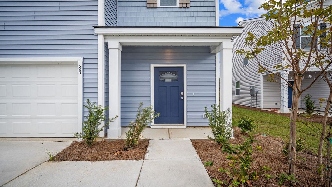 Exterior details and patio area of a home in The Lakes at North Glynn, Brunswick (Image 3).