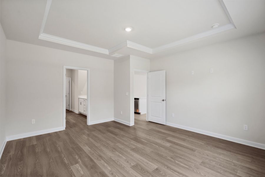 Spacious, unfurnished interior of a new home in Cypress Ridge - The Coastline Series, Longs (Image 23).