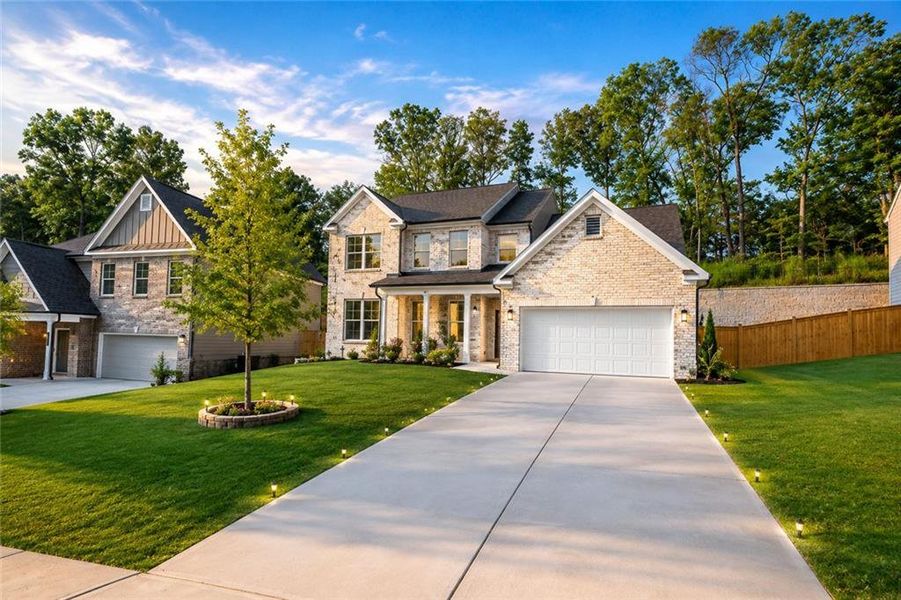 Front exterior of a new home in , Lawrenceville, GA, highlighting curb appeal (Image 25). Front exterior of a new home in , Lawrenceville, GA, highlighting curb appeal (Image 25).