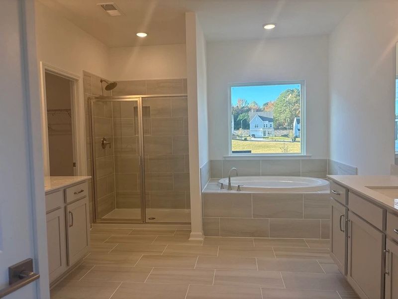 Primary Bath featuring the AW Collection® Milan - Clean geometry and high-contrast finishes.