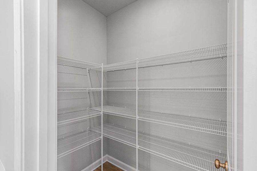 Representative unfurnished interior of a home built from the Weymouth by Caviness & Cates Communities in Bartlett Manor, Youngsville (Image 53).