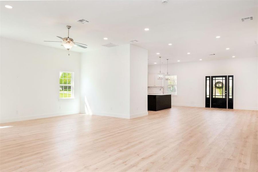 Open floorplan is cheerful and light filled, flexibility in allocating the space.