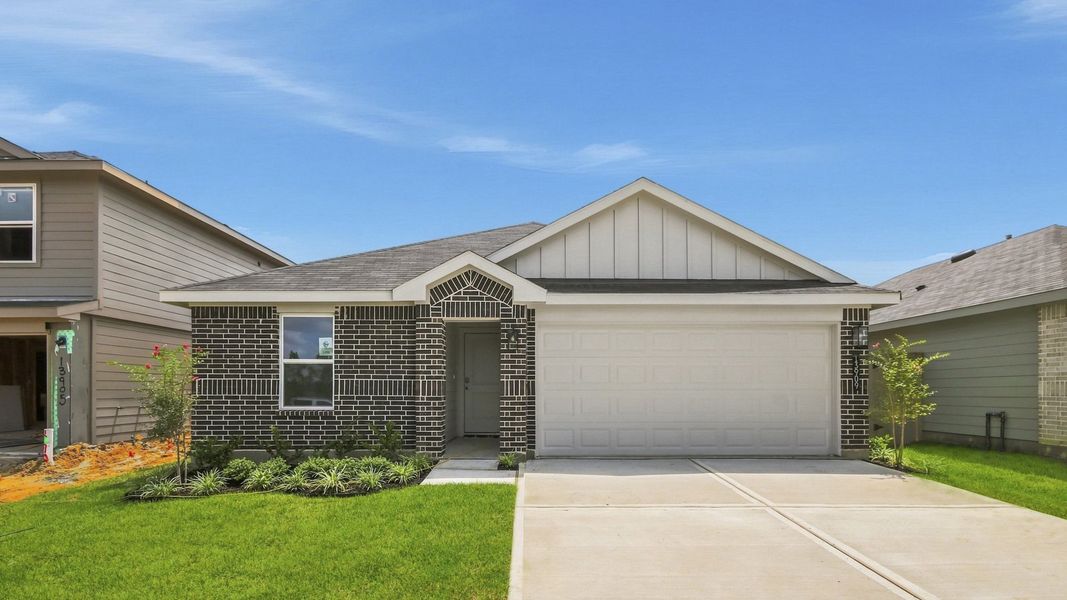 Front exterior of a new home in The Canopies, Splendora, TX, highlighting curb appeal (Image 2). Front exterior of a new home in The Canopies, Splendora, TX, highlighting curb appeal (Image 2).