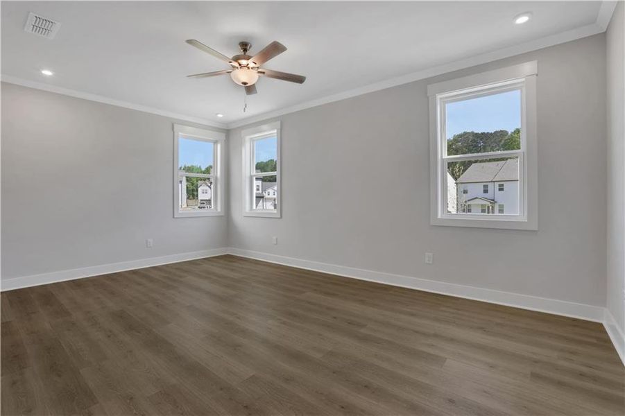 Spacious, unfurnished interior of a new home in The Paddocks at Doc Hughes, Buford (Image 18).
