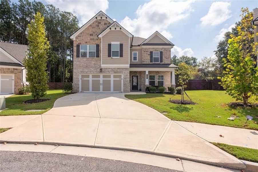 Front exterior of a new home in , Lawrenceville, GA, highlighting curb appeal (Image 22).