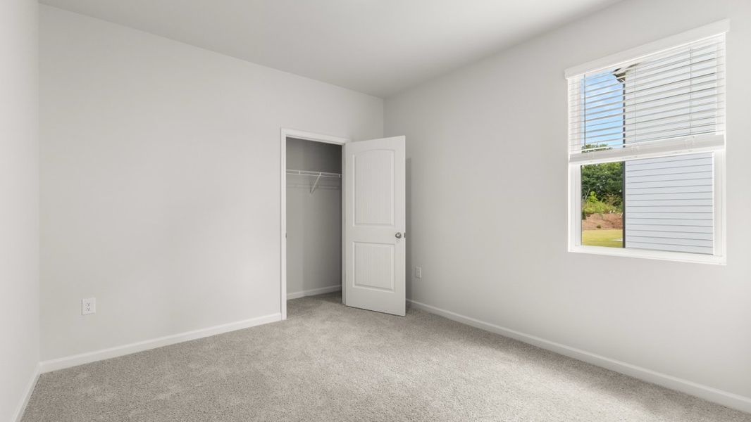 Representative unfurnished interior of a home built from the Booth by D.R. Horton in Grandview at Lanier, Dawsonville (Image 30).