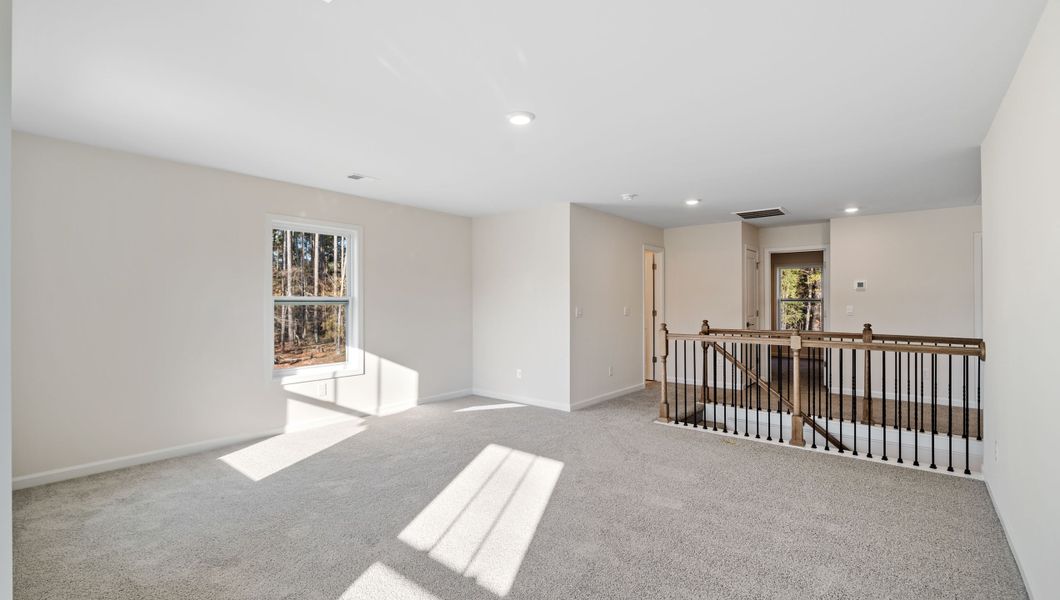 Representative unfurnished interior of a home built from the LONDON by D.R. Horton in Adams Glen, Greenville (Image 31).