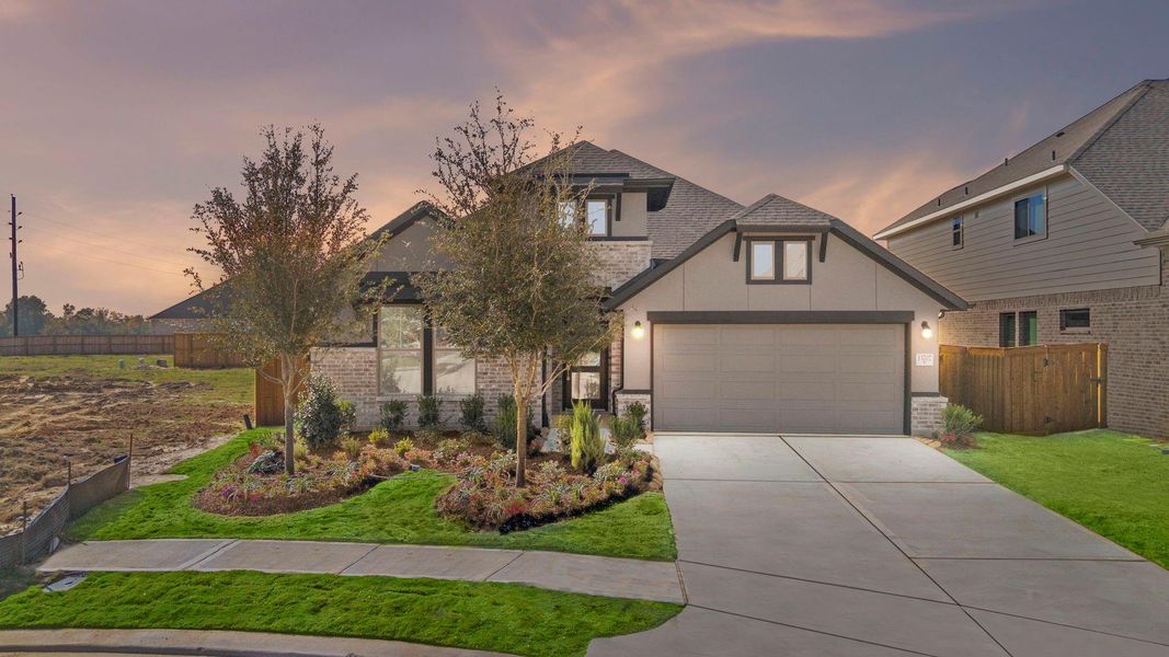 Front exterior of a new home in Dunham Pointe 50', Cypress, TX, highlighting curb appeal (Image 20).