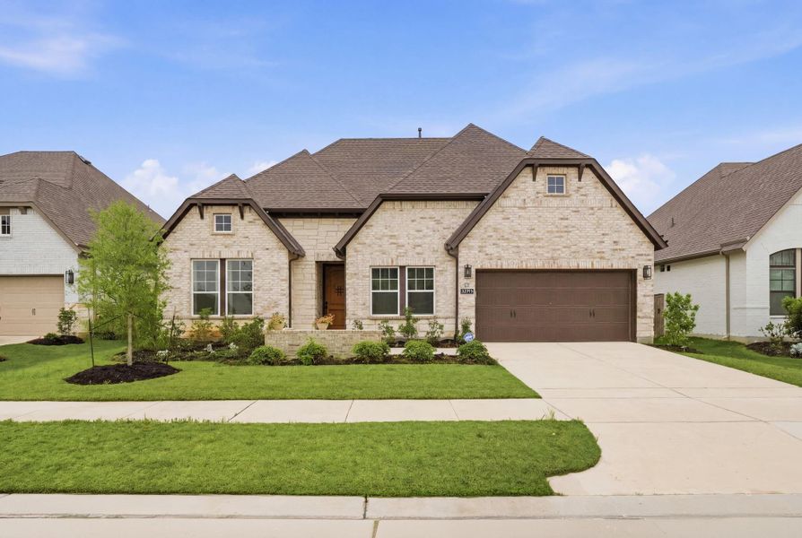 Front exterior of a new home in , Cypress, TX, highlighting curb appeal (Image 2). Front exterior of a new home in , Cypress, TX, highlighting curb appeal (Image 2).