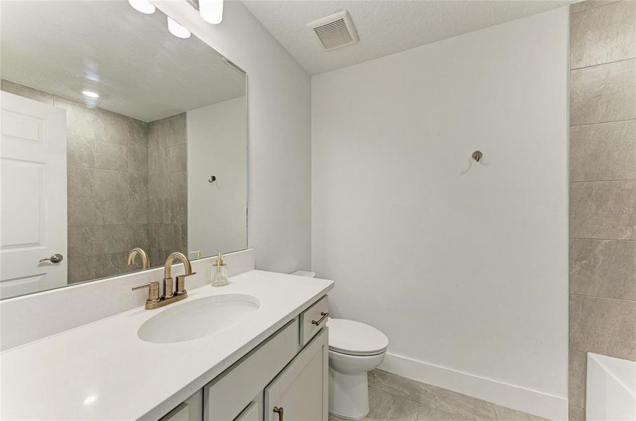 Furnished interior view inside a new home in Nautique at Waterside, Sarasota (Image 17).