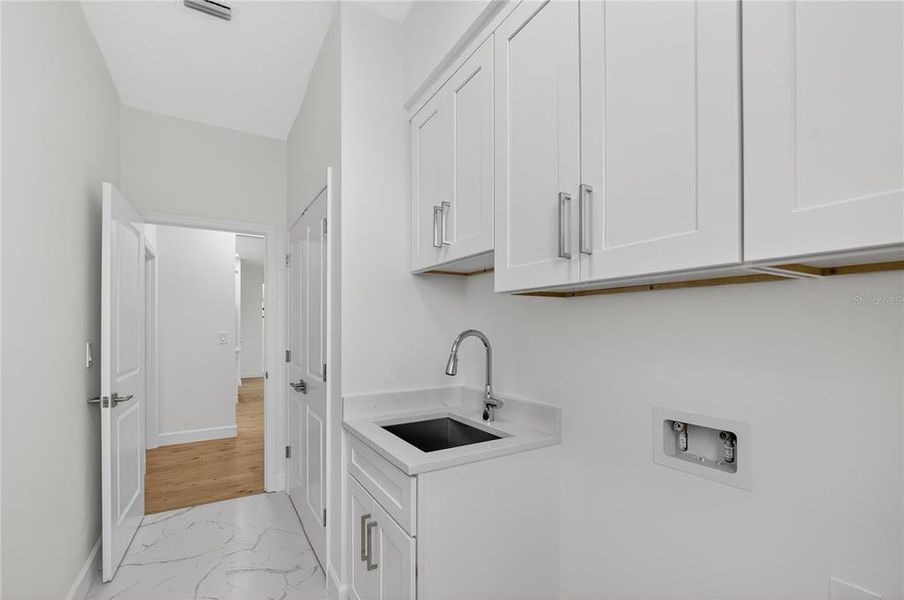 Furnished interior view inside a new home in , North Port (Image 12).