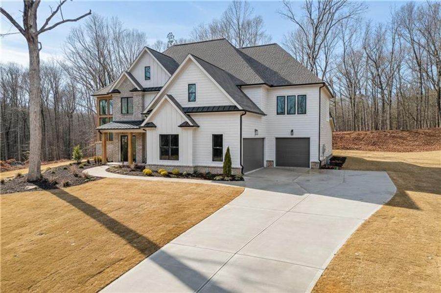 Front exterior of a new home in , Pendergrass, GA, highlighting curb appeal (Image 25).