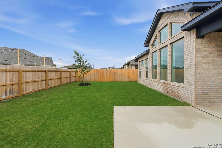 Exterior details and patio area of a home in Alsatian Oaks, Castroville (Image 25).