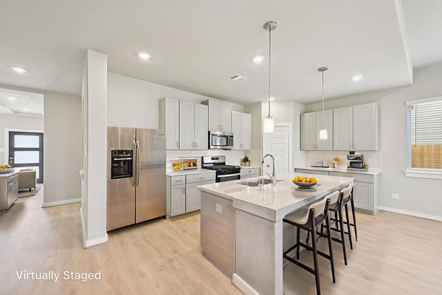 Photo is not of the actual home, but is an inspirational photo of builder’s model home and may depict options, furnishings, and/or decorator features that are not included