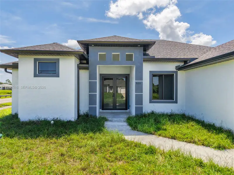 Exterior details and patio area of a home in , Lehigh Acres (Image 4). Exterior details and patio area of a home in , Lehigh Acres (Image 4).