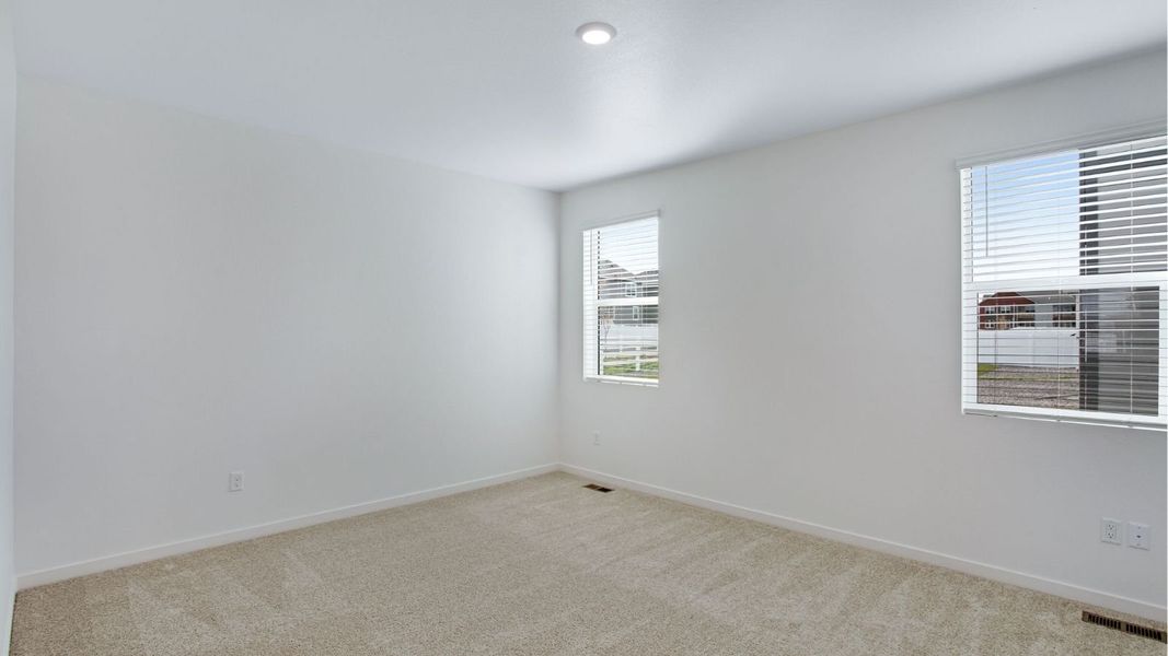 Representative unfurnished interior of a home built from the Newcastle by D.R. Horton in Tailholt, Severance (Image 11).