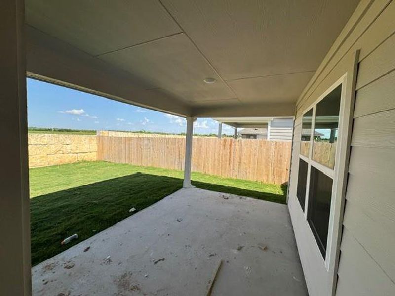 Exterior details and patio area of a home in Hunters Glen, Jarrell (Image 3). Exterior details and patio area of a home in Hunters Glen, Jarrell (Image 3).