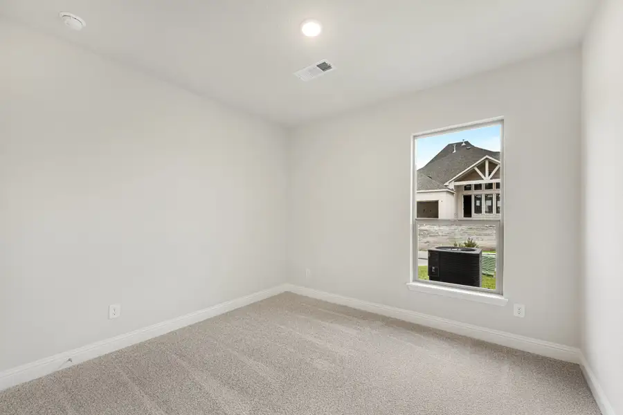 Spacious, unfurnished interior of a new home in Cottonwood Creek, Rowlett (Image 38).