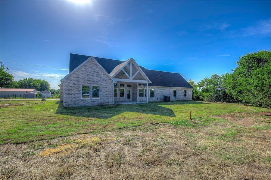 Front exterior of a new home in , Farmersville, TX, highlighting curb appeal (Image 21).