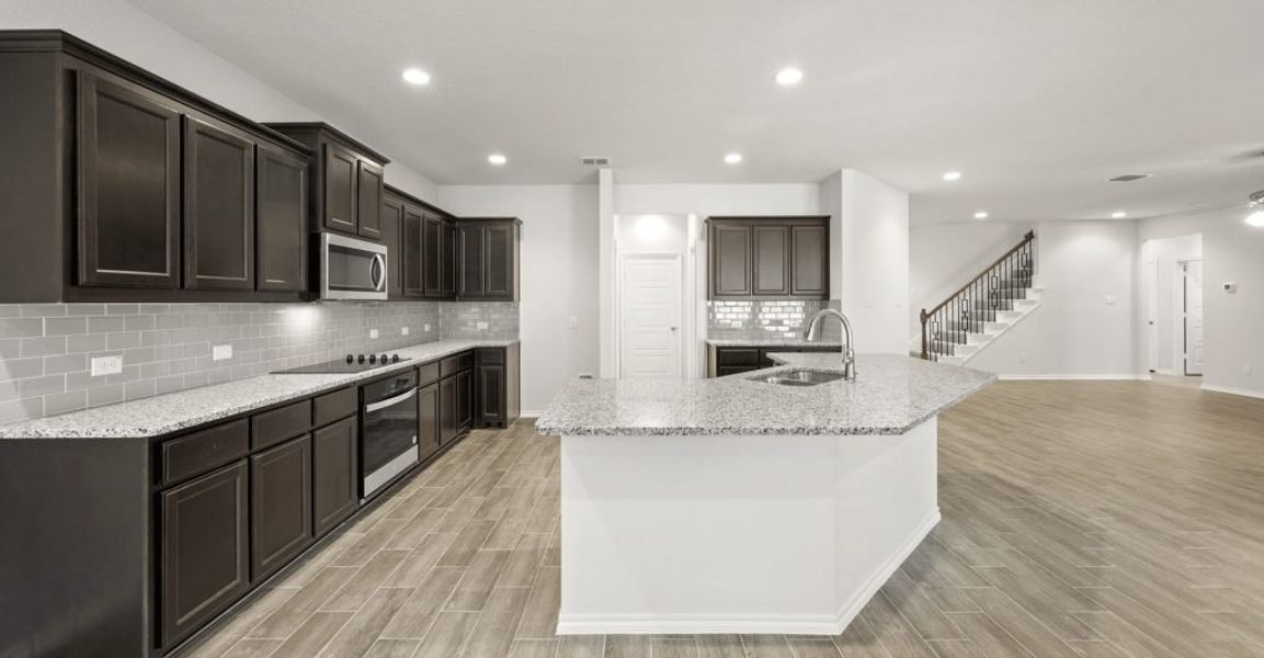 Representative exterior photo of a completed home built from the Hadleigh by Impression Homes in Mountain Valley, Burleson, TX (Image 6). Representative exterior photo of a completed home built from the Hadleigh by Impression Homes in Mountain Valley, Burleson, TX (Image 6).