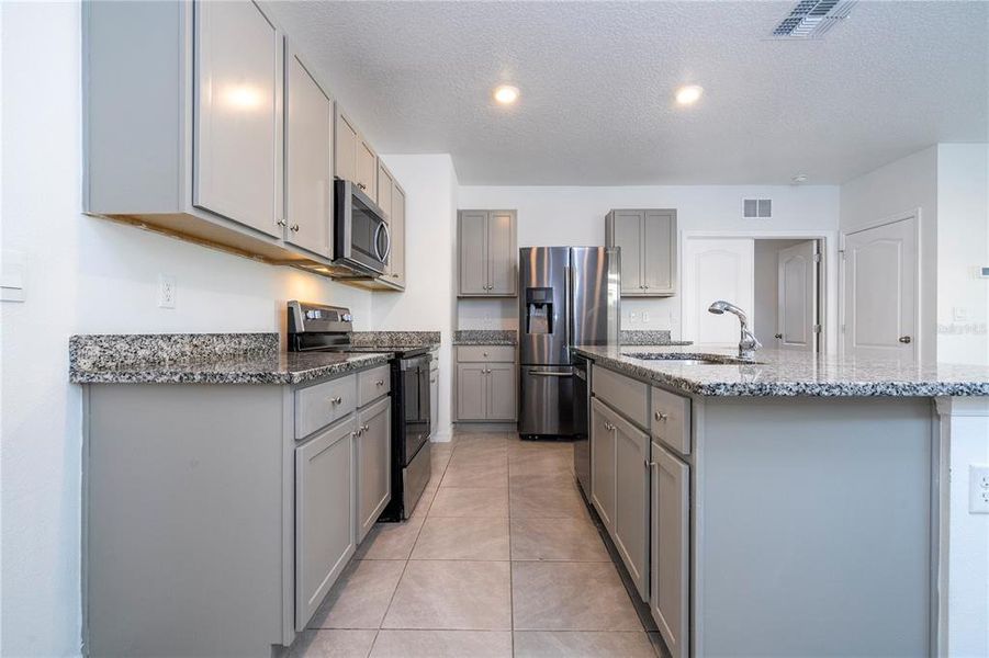 Furnished interior view inside a new home in Astonia, Davenport (Image 9).
