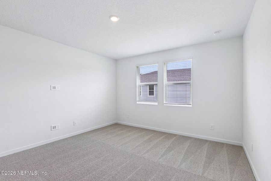 Spacious, unfurnished interior of a new home in Flagler Village - Signature Series, Palm Coast (Image 28).