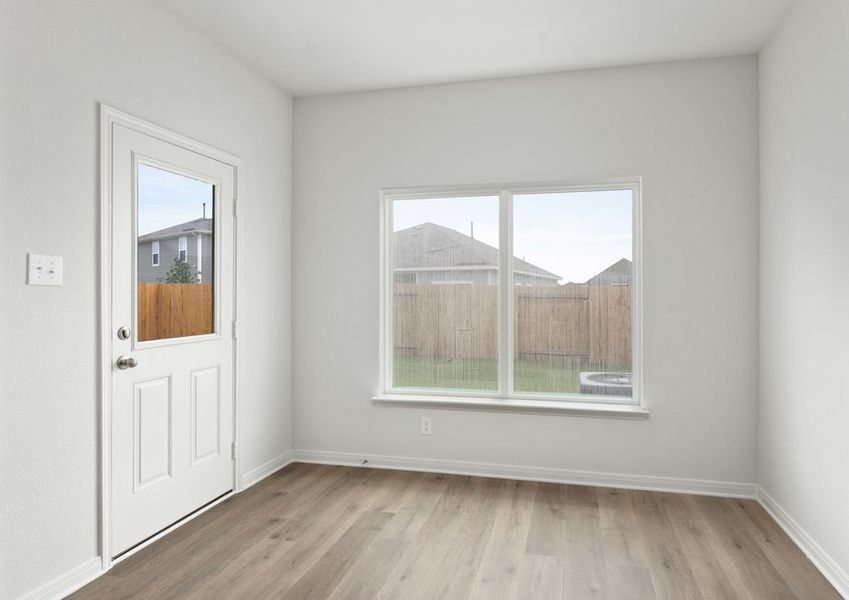 The dining room has a window that lets in great, natural light.