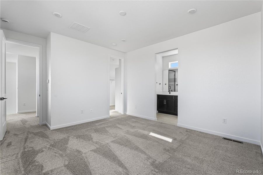 Spacious, unfurnished interior of a new home in Tribute at Lyric, Lone Tree (Image 22).